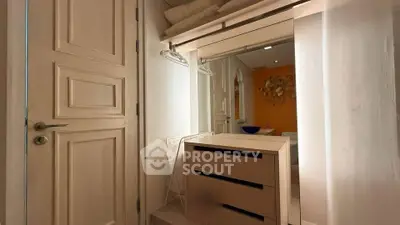 Charming bathroom with elegant decor and ample storage space, perfect for modern living.