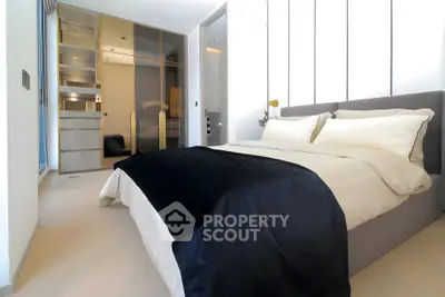 Luxurious modern bedroom with elegant design and spacious walk-in closet