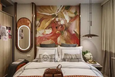 Luxurious bedroom with artistic wall design and elegant decor, perfect for modern living.