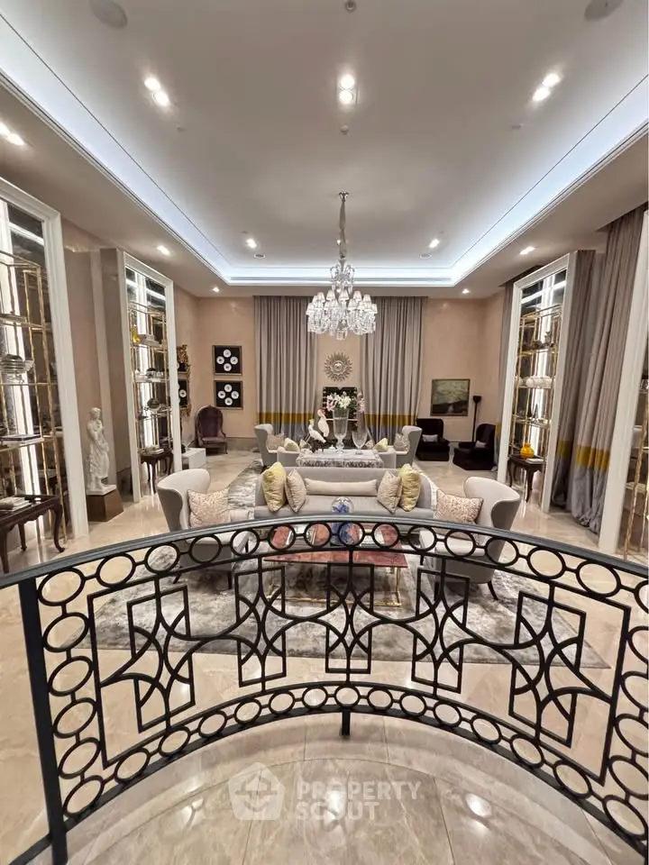 Luxurious living room with elegant chandelier and stylish decor