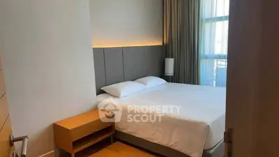 Modern bedroom with cozy lighting and minimalist design