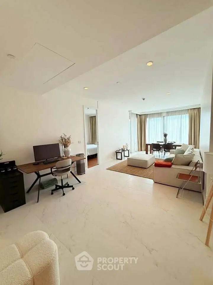Spacious modern living room with elegant decor and natural light