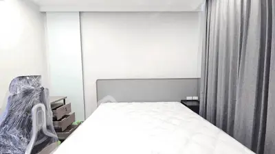 Modern bedroom with minimalist design and sleek furniture