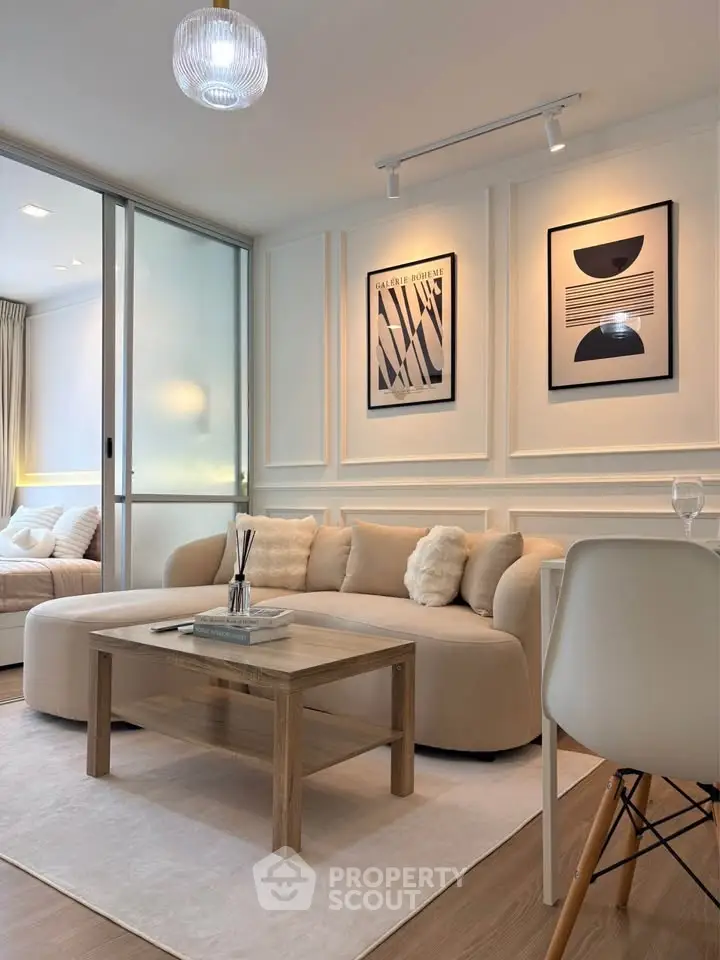 Elegant living room with modern decor and cozy seating area