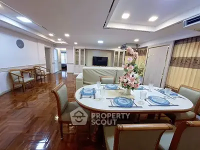 Spacious living room with elegant dining area and modern decor