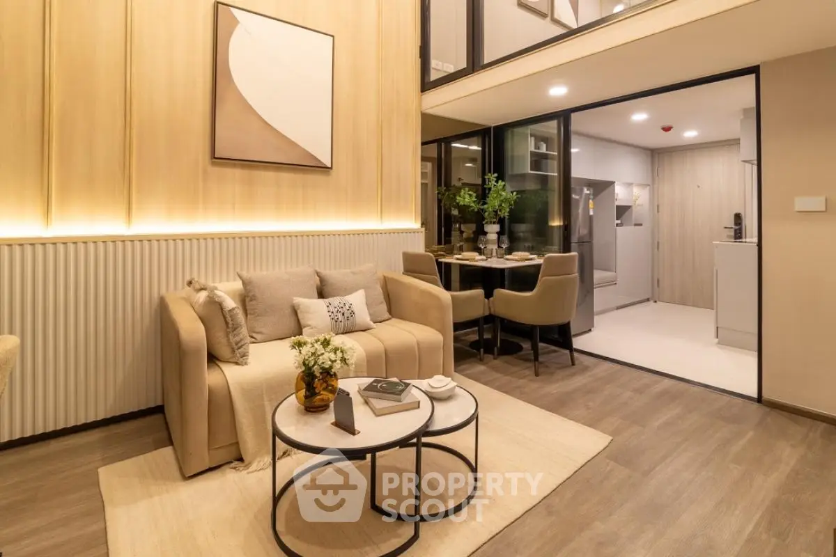 Luxurious modern living room with open kitchen and elegant decor