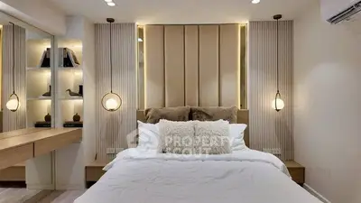 Luxurious modern bedroom with elegant lighting and plush bedding