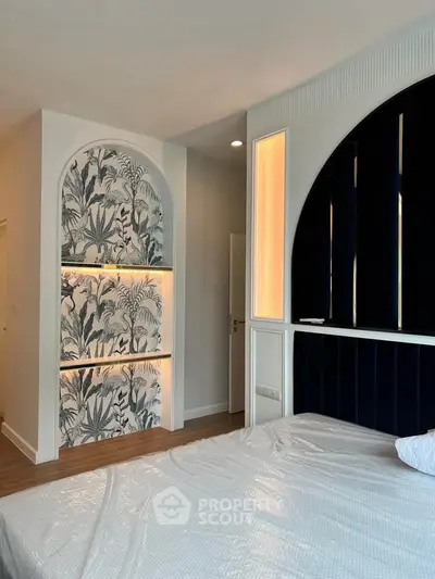 Stylish bedroom with modern design and unique wall decor