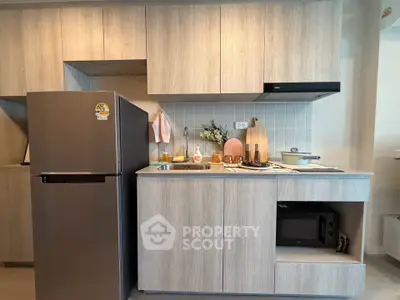 Modern kitchen with sleek cabinetry and stainless steel appliances