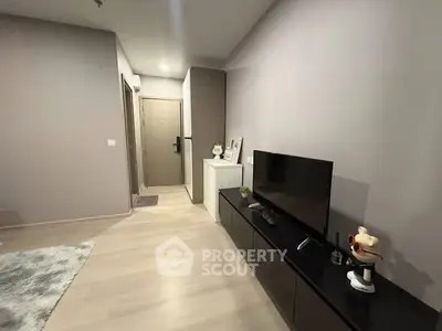 Modern living room with sleek TV stand and minimalist decor