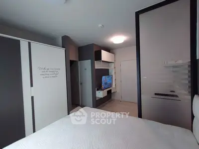 Modern bedroom with sleek design and built-in storage solutions