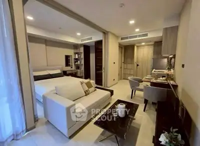 Modern studio apartment with open layout and stylish furnishings