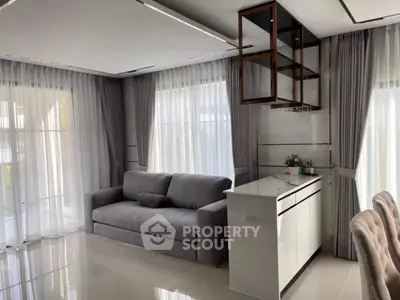 Modern living room with elegant curtains and sleek furniture design
