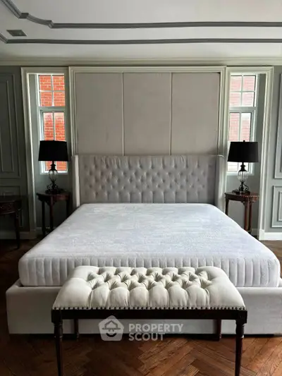 Luxurious bedroom with elegant tufted bed and stylish decor