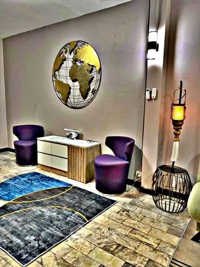 Stylish modern living room with world map decor and elegant seating