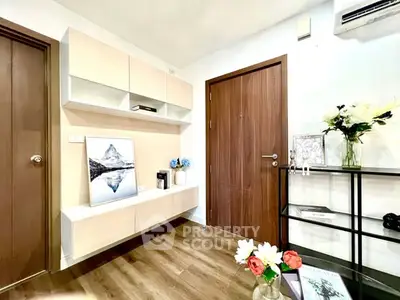 Modern living room with stylish decor and wooden flooring