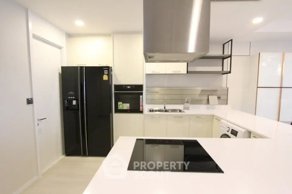Modern kitchen with sleek appliances and open layout design
