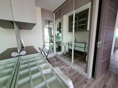 Modern bedroom with mirrored wardrobe and stylish decor
