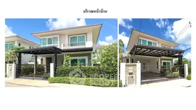 Charming two-story residence with lush landscaping and a spacious carport, boasting a modern design with a welcoming entrance.
