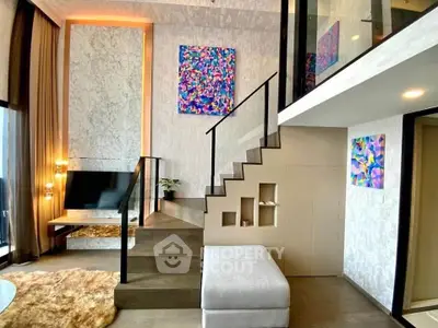 Modern duplex living room with stylish decor and mezzanine level