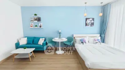 Modern studio apartment with stylish decor and cozy furnishings