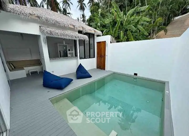 Charming tropical villa with private pool and lush greenery, perfect for serene getaways.