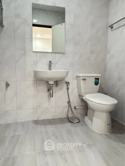 Modern bathroom with sleek fixtures and elegant tile design