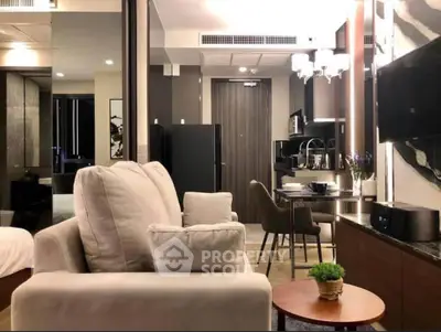 Modern living room with open kitchen in stylish apartment