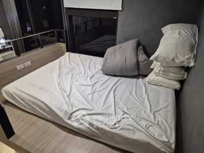 Modern bedroom with minimalist design and cozy bedding