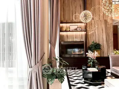Luxurious living room with elegant decor and modern lighting
