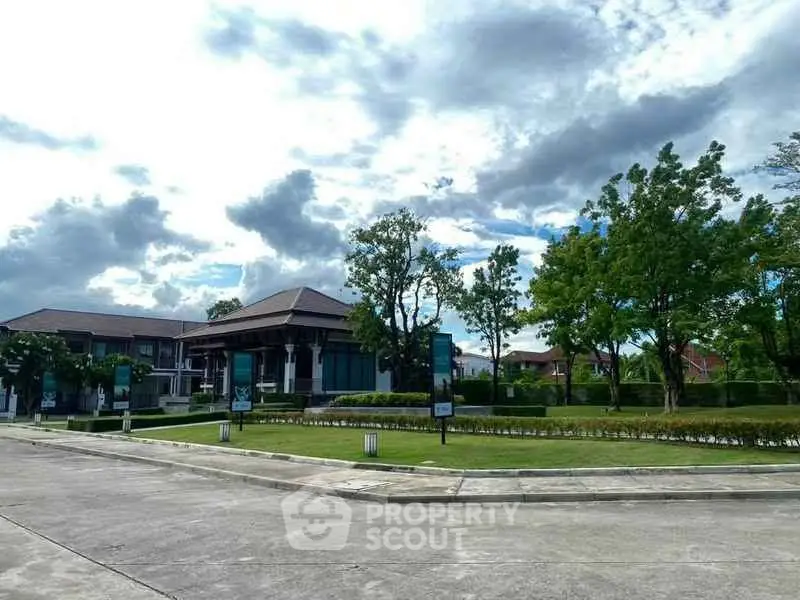 Stunning residential property with lush greenery and spacious surroundings.