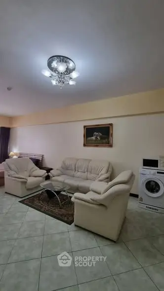 Spacious living room with elegant furniture and modern lighting