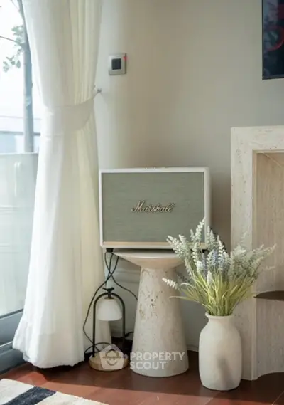 Stylish living room corner with elegant decor and natural light