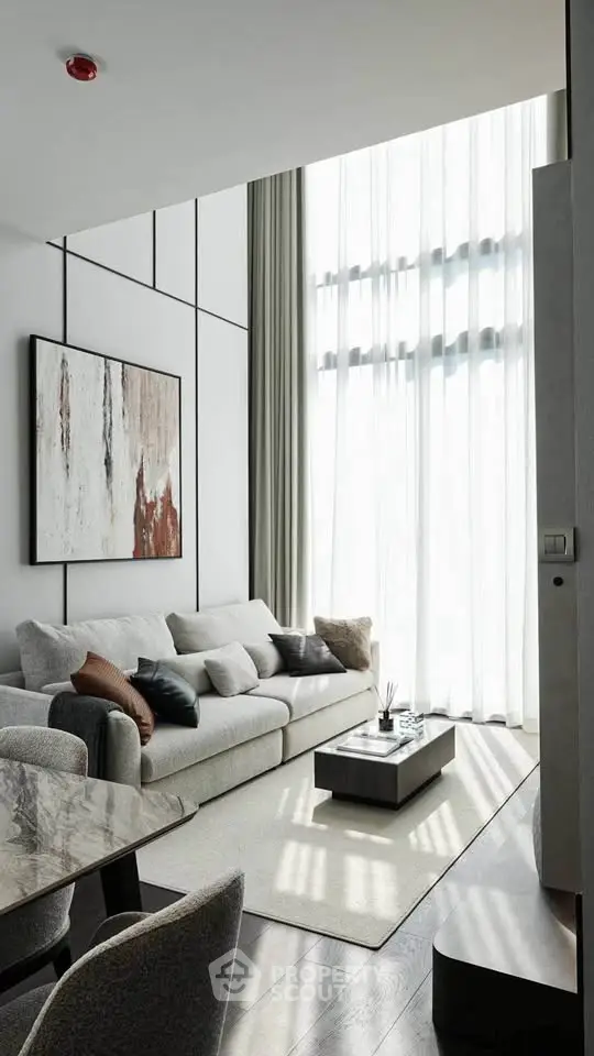 Modern living room with high ceilings and elegant decor