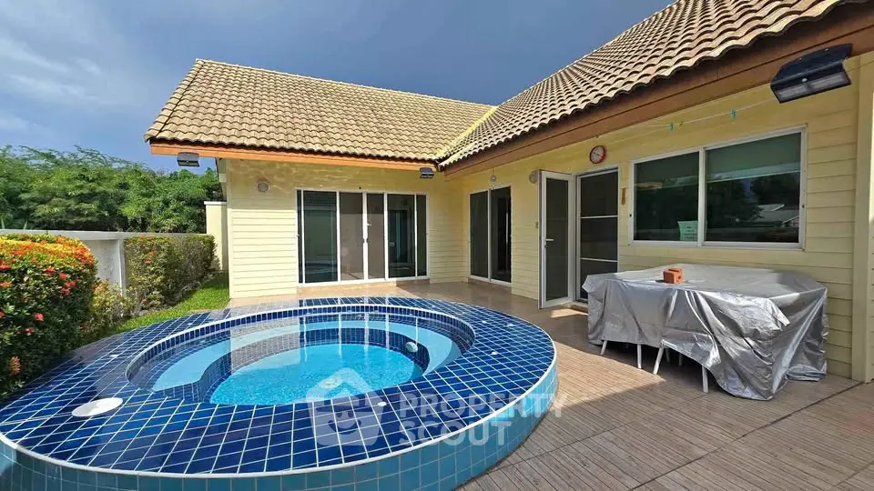 Charming villa with private outdoor pool and spacious patio area, perfect for relaxation and entertainment.