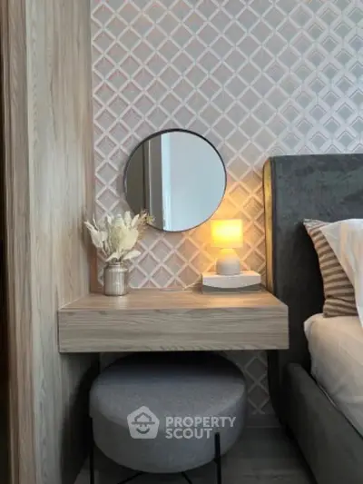 Stylish bedroom corner with modern decor and ambient lighting