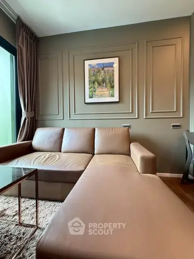 Elegant living room with modern sectional sofa and stylish wall art