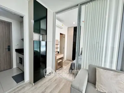 Modern apartment interior with sleek design and glass partitions
