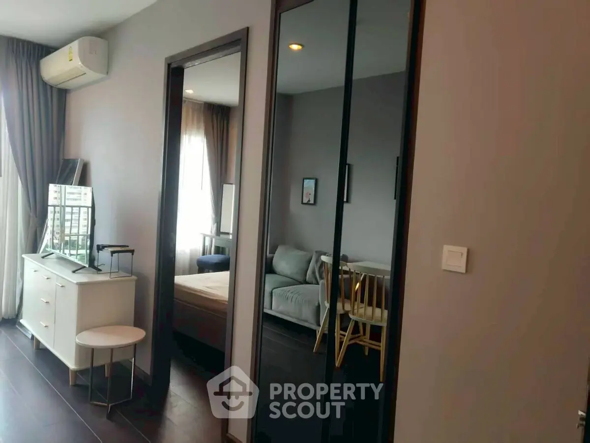 Modern apartment interior with sleek furniture and large windows