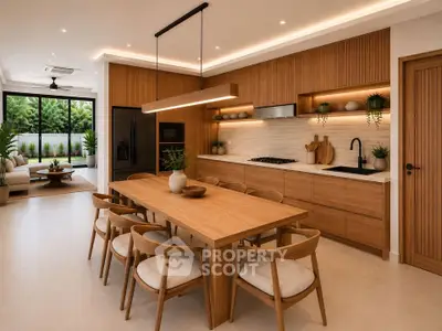 Luxurious open-plan kitchen and dining area with modern wooden finishes and natural light.