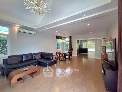Spacious modern living room with elegant decor and natural light