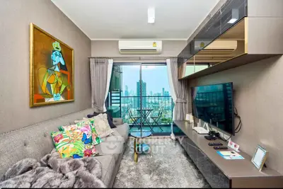 Stylish living room with city view, modern decor, and balcony access.