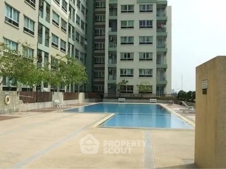 Modern apartment building with spacious outdoor pool area
