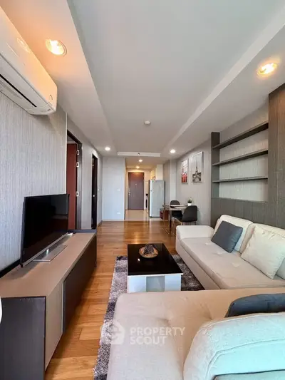 Spacious modern living room with elegant decor and natural light