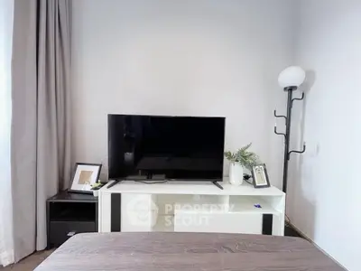 Modern living room with sleek TV setup and stylish decor