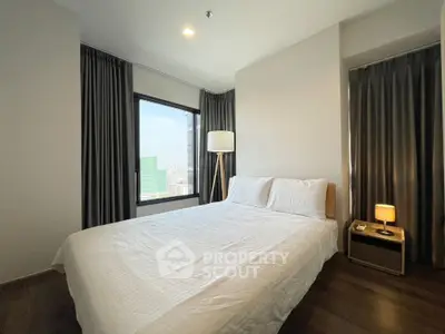 Modern bedroom with city view and elegant decor
