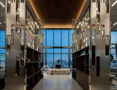 Luxurious modern living room with panoramic city view and elegant decor.