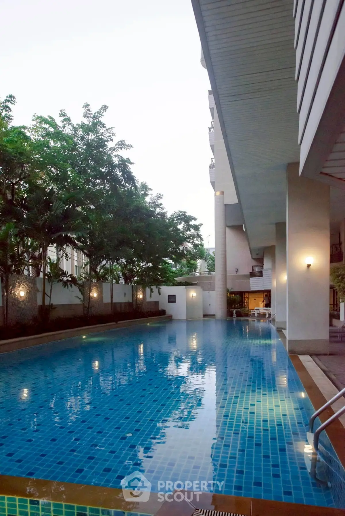 Luxurious residential pool area with serene ambiance and modern design