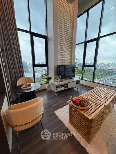Luxurious high-rise living room with stunning city view and modern decor