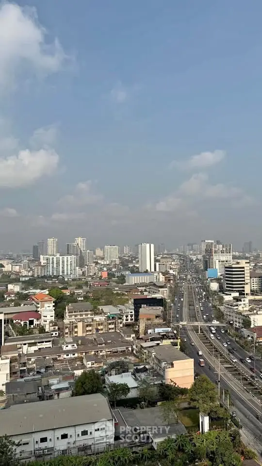 Stunning cityscape view showcasing urban skyline and bustling roads, perfect for real estate investment.